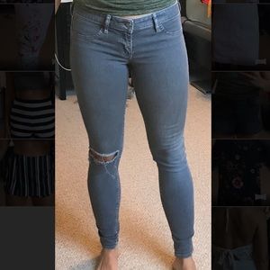 Hollister grey jeans with hole in knee